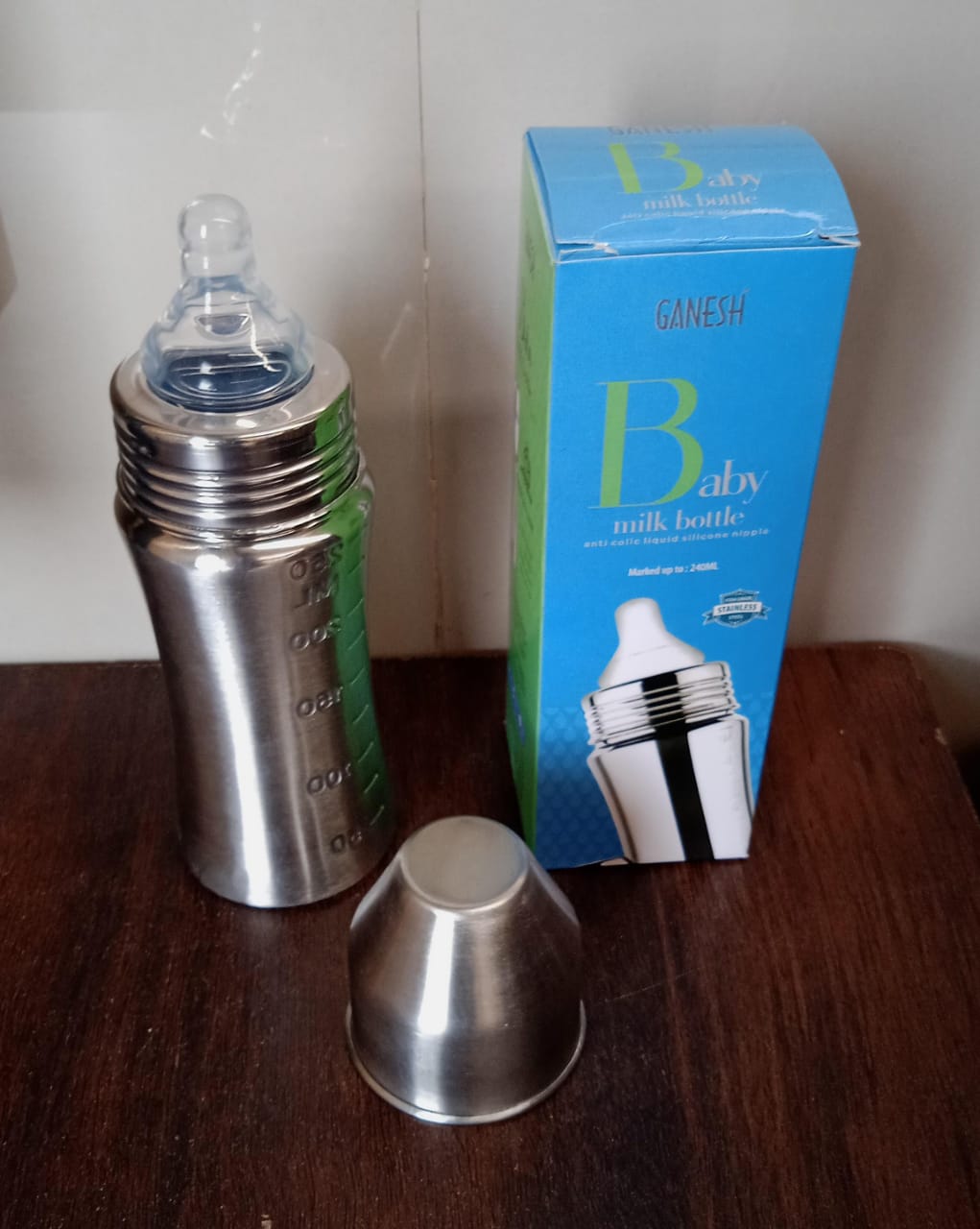 Ganesh Stainless Steel Baby Feeding Bottle, Milk Bottle for New Born / Infants / Toddler Up to 3 Years, BFA Free (250 ML Approx) Ganesh Stainless Steel Baby Feeding Bottle, Milk Bottle for New Born / Infants / Toddler Up to 3 Years, BFA Free (250 ML Approx)